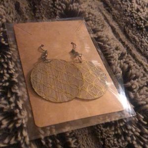 Homemade wooden earrings in gold